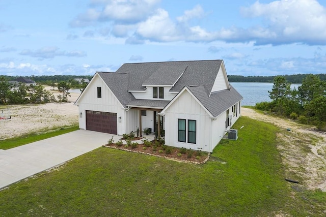52554 Shore Dr, Franklinton, LA 70438 - modern farmhouse style home featuring board and batten siding, roof with shingles, driveway, and a front yard