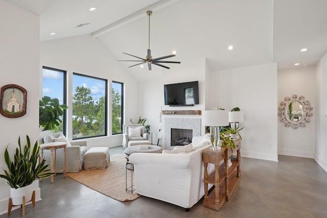52554 Shore Dr, Franklinton, LA 70438 - living room with concrete floors, a tile fireplace, high vaulted ceiling, recessed lighting, and a ceiling fan