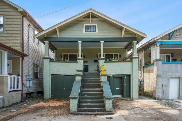 432426 Banks St, New Orleans, LA 70119 - view of front of house with a porch and stairway