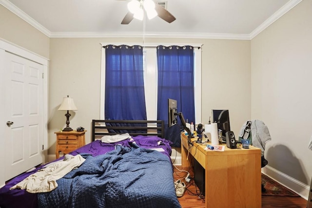 432426 Banks St, New Orleans, LA 70119 - bedroom featuring wood finished floors, crown molding, and a ceiling fan