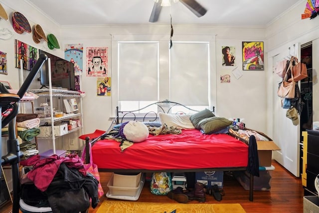 432426 Banks St, New Orleans, LA 70119 - bedroom featuring wood finished floors, ornamental molding, and a ceiling fan