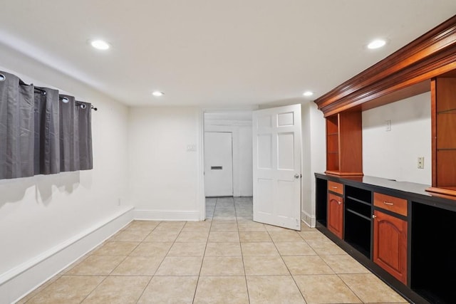 432426 Banks St, New Orleans, LA 70119 - kitchen featuring dark countertops, recessed lighting, and light tile patterned floors