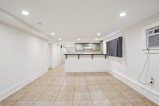 432426 Banks St, New Orleans, LA 70119 - unfurnished living room with recessed lighting and light tile patterned floors