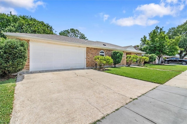 4013 Taft Park, Metairie, LA 70002 - single story home with brick siding, a front yard, driveway, and a garage