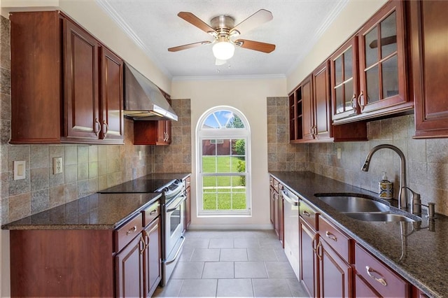 4013 Taft Park, Metairie, LA 70002 - kitchen with appliances with stainless steel finishes, wall chimney exhaust hood, dark brown cabinets, ornamental molding, and dark stone counters