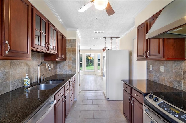4013 Taft Park, Metairie, LA 70002 - kitchen with exhaust hood, stainless steel appliances, a textured ceiling, a ceiling fan, and ornamental molding