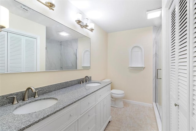 4013 Taft Park, Metairie, LA 70002 - bathroom with a closet, a marble finish shower, and double vanity