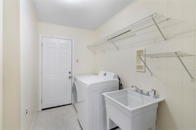 4013 Taft Park, Metairie, LA 70002 - washroom with washer / clothes dryer, light tile patterned floors, and ornamental molding