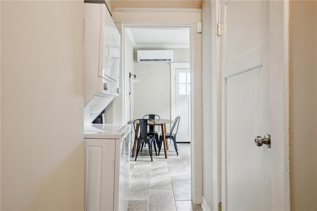 62426 9th St, New Orleans, LA 70115 - hall featuring stacked washing machine and dryer, a wall mounted AC, and ornamental molding