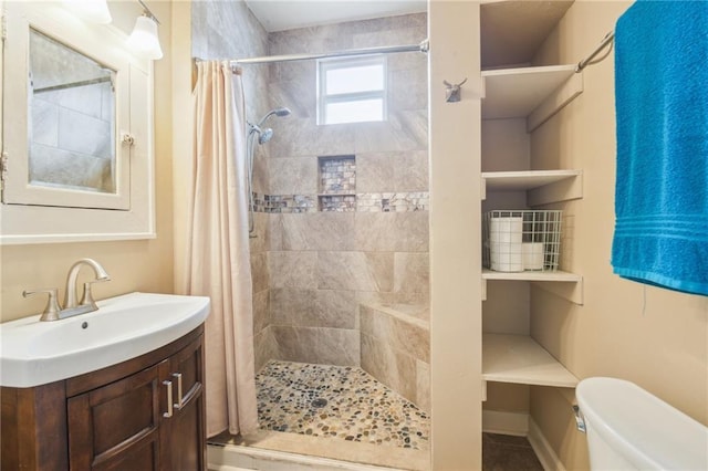 62426 9th St, New Orleans, LA 70115 - bathroom with a tile shower and vanity