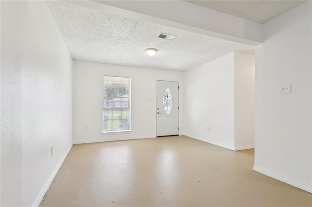 601 Jw Davis Dr, Hammond, LA 70403 - foyer featuring finished concrete flooring and baseboards