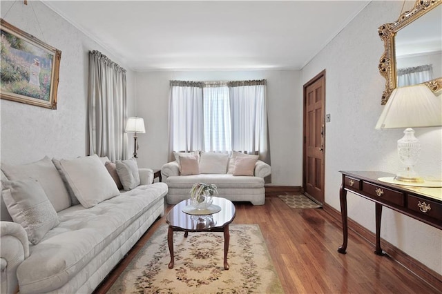 2727 Carondelet St, New Orleans, LA 70130 - living area with wood finished floors, ornamental molding, and a textured wall