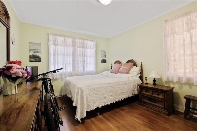 2727 Carondelet St, New Orleans, LA 70130 - bedroom with wood finished floors and ornamental molding