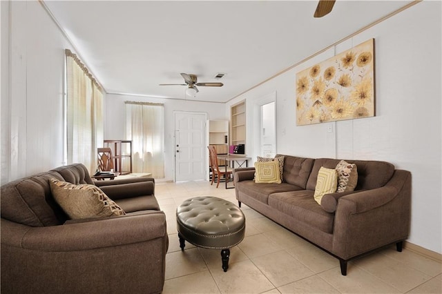 2727 Carondelet St, New Orleans, LA 70130 - living area featuring a ceiling fan and light tile patterned flooring