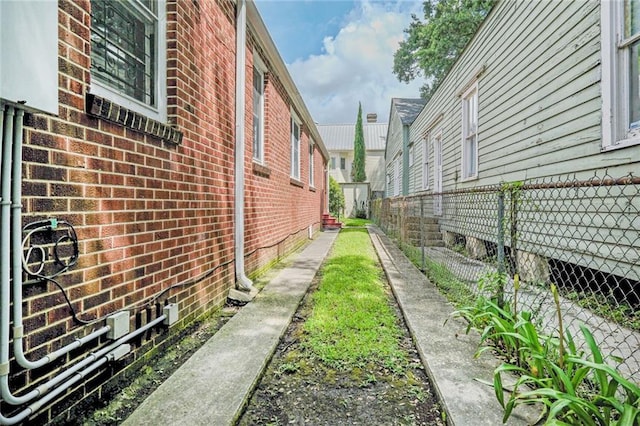 2727 Carondelet St, New Orleans, LA 70130 - view of property exterior with brick siding