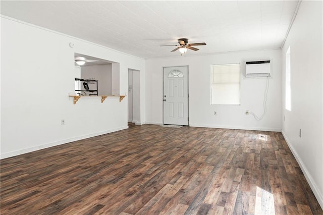 564 Mathew St, Lafitte, LA 70067 - unfurnished living room with a ceiling fan, dark wood-type flooring, crown molding, and a wall unit AC