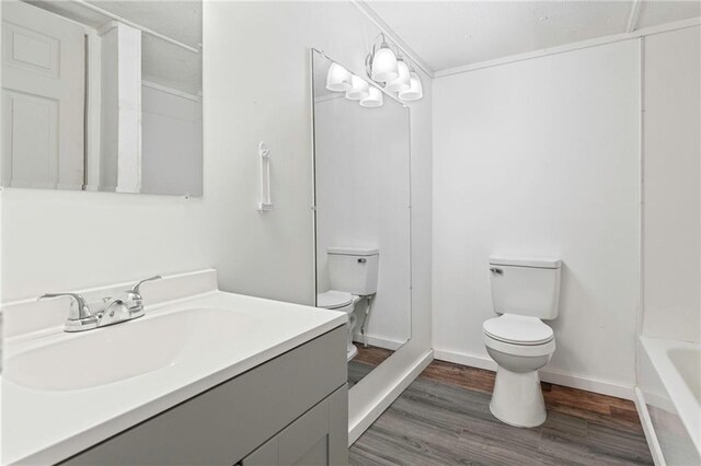 564 Mathew St, Lafitte, LA 70067 - bathroom featuring wood finished floors and vanity