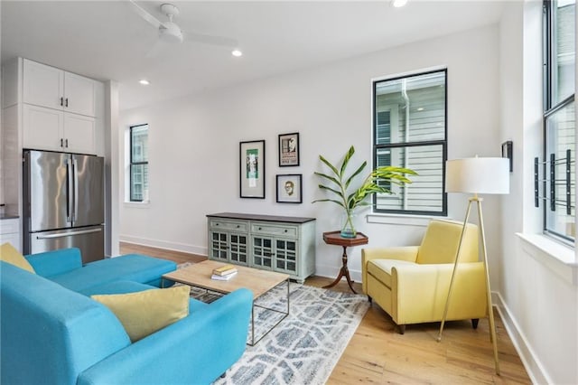 810 N Roman St, New Orleans, LA 70116 - living area with light wood-style flooring and recessed lighting