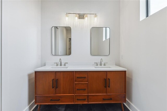 810 N Roman St, New Orleans, LA 70116 - full bath featuring double vanity and tile patterned floors