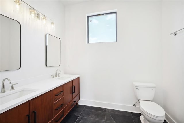 810 N Roman St, New Orleans, LA 70116 - bathroom with double vanity and tile patterned flooring