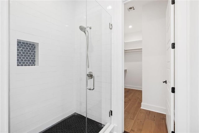 810 N Roman St, New Orleans, LA 70116 - full bath with a shower stall, a spacious closet, wood finished floors, and recessed lighting