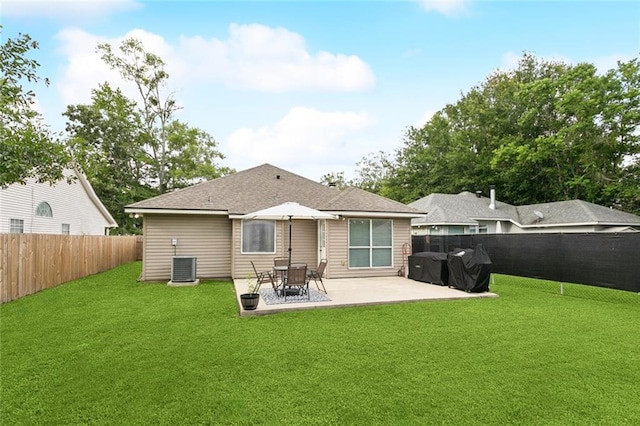 2311 Jay St, Slidell, LA 70460 - back of house featuring a fenced backyard, a patio, and roof with shingles