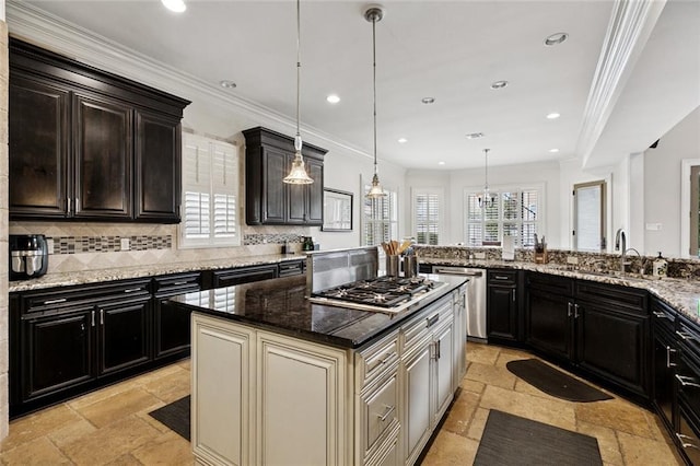 154 Primrose Dr, Belle Chasse, LA 70037 - kitchen with appliances with stainless steel finishes, stone tile floors, ornamental molding, decorative backsplash, and light stone countertops