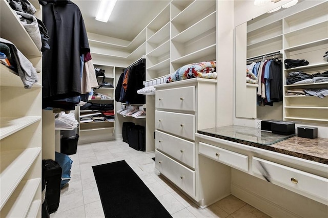 154 Primrose Dr, Belle Chasse, LA 70037 - walk in closet featuring light tile patterned floors