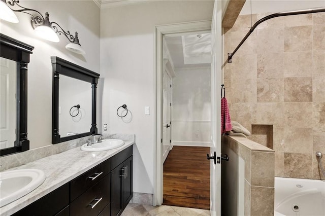 154 Primrose Dr, Belle Chasse, LA 70037 - bathroom featuring a tub with jets, double vanity, a shower, crown molding, and tile patterned floors