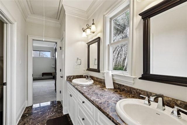 154 Primrose Dr, Belle Chasse, LA 70037 - bathroom featuring marble tiled floors, double vanity, and crown molding