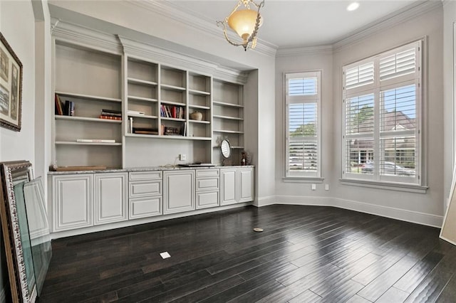 154 Primrose Dr, Belle Chasse, LA 70037 - unfurnished dining area with dark wood-type flooring and ornamental molding
