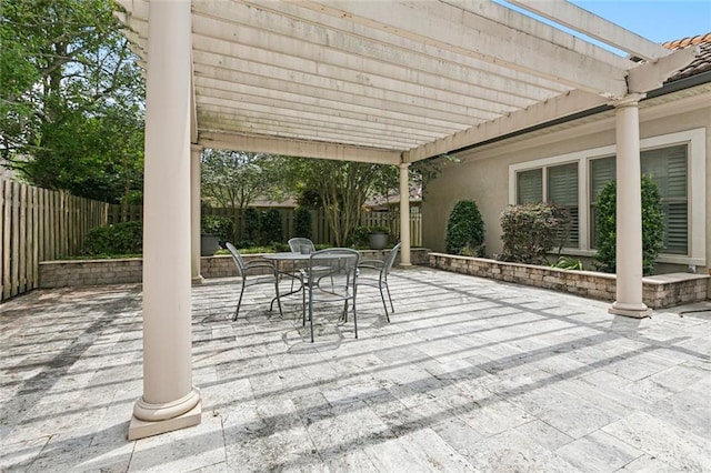 154 Primrose Dr, Belle Chasse, LA 70037 - fenced backyard with a pergola, outdoor dining area, and a patio