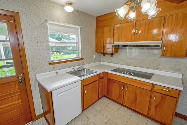 4213 Purdue Dr, Metairie, LA 70003 - kitchen featuring under cabinet range hood, black electric stovetop, wallpapered walls, dishwasher, and light countertops