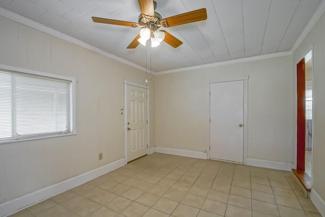 4213 Purdue Dr, Metairie, LA 70003 - empty room featuring ornamental molding, light tile patterned floors, and a ceiling fan