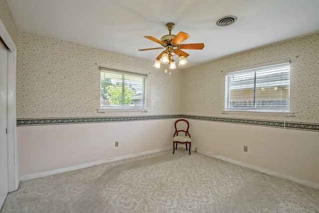 4213 Purdue Dr, Metairie, LA 70003 - empty room featuring ceiling fan, light colored carpet, and wallpapered walls