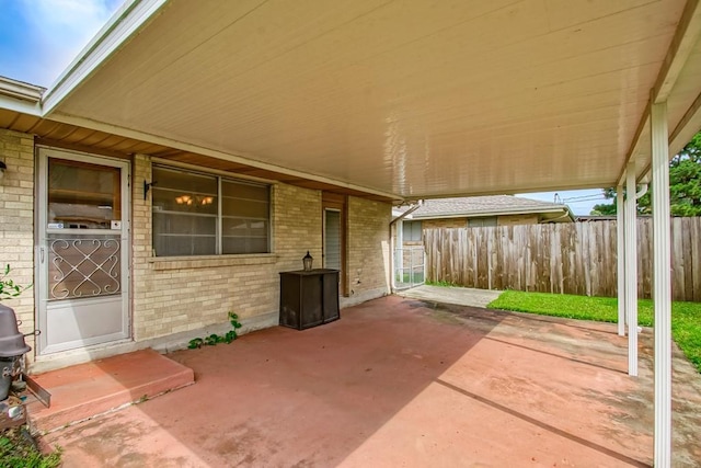 4213 Purdue Dr, Metairie, LA 70003 - view of patio / terrace featuring an attached carport