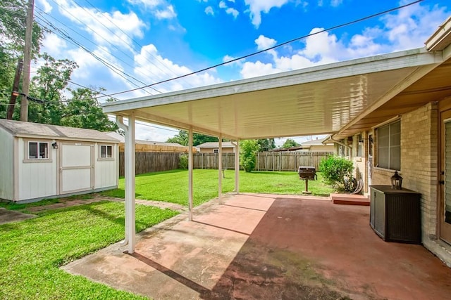 4213 Purdue Dr, Metairie, LA 70003 - fenced backyard featuring a patio, a shed, and a carport