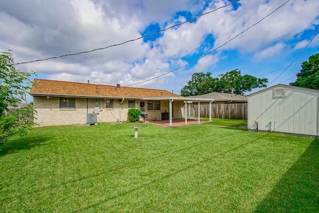 4213 Purdue Dr, Metairie, LA 70003 - rear view of house with a patio area, a shed, and brick siding