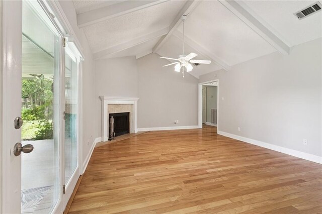 1605 Rue Lemans, Slidell, LA 70458 - unfurnished living room with light wood-style floors, ceiling fan, and a high end fireplace