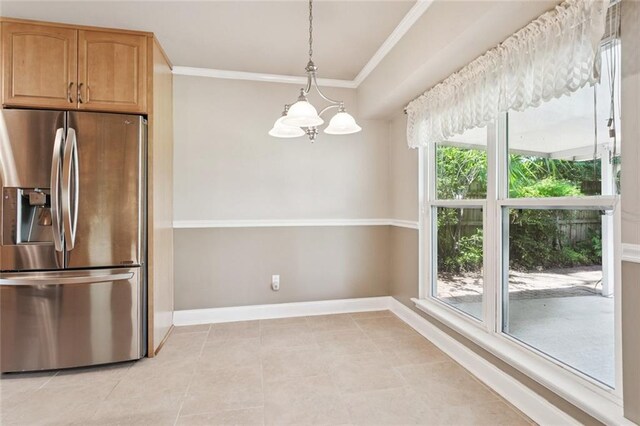 1605 Rue Lemans, Slidell, LA 70458 - kitchen with stainless steel fridge, a chandelier, ornamental molding, light tile patterned floors, and pendant lighting