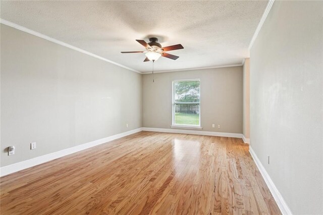 1605 Rue Lemans, Slidell, LA 70458 - empty room with ornamental molding, light wood finished floors, ceiling fan, and a textured ceiling