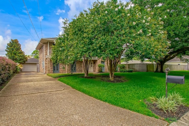 8808 Chretien Point Pl, River Ridge, LA 70123 - obstructed view of property with brick siding and a detached garage