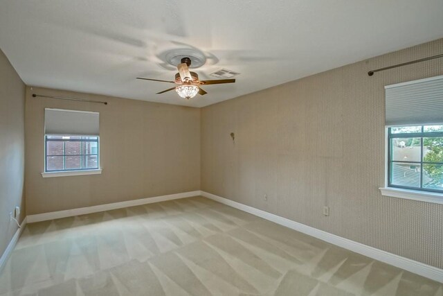 8808 Chretien Point Pl, River Ridge, LA 70123 - empty room with light colored carpet and ceiling fan