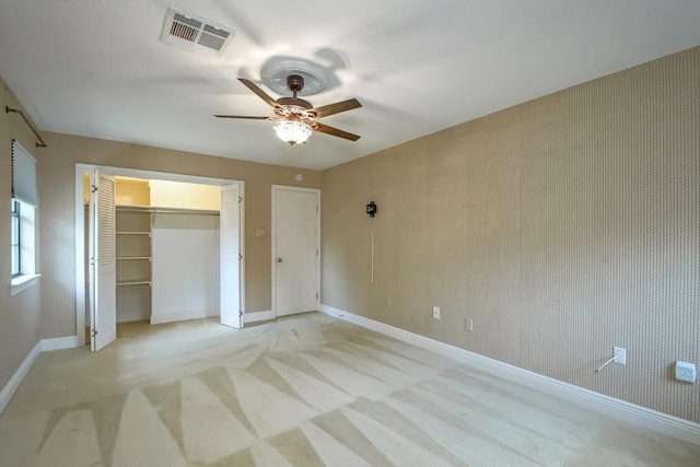 8808 Chretien Point Pl, River Ridge, LA 70123 - unfurnished bedroom featuring light carpet, ceiling fan, and a closet