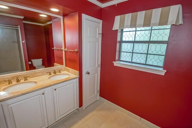 8808 Chretien Point Pl, River Ridge, LA 70123 - full bath with crown molding, tile patterned flooring, and double vanity