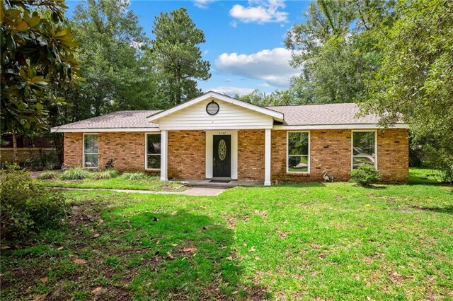 2142 Park Dr, Slidell, LA 70458 - single story home featuring a front lawn and brick siding