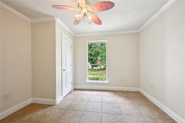 2142 Park Dr, Slidell, LA 70458 - unfurnished room with light tile patterned floors, ceiling fan, a textured ceiling, and ornamental molding