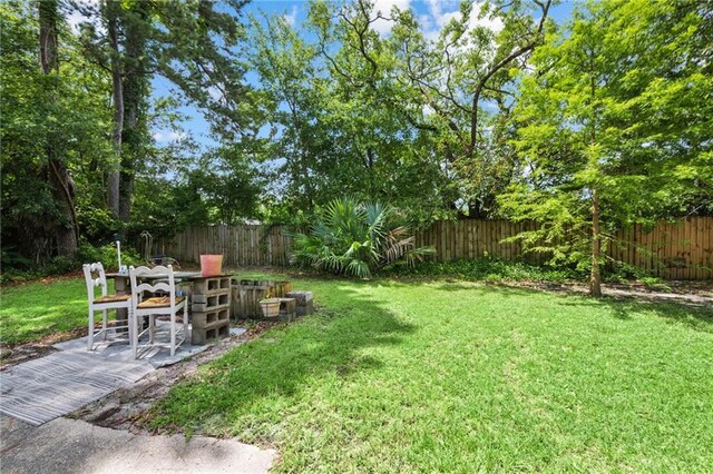 2142 Park Dr, Slidell, LA 70458 - fenced backyard with a patio