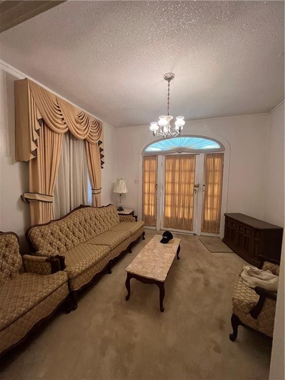 842426 Willow St, New Orleans, LA 70118 - living room featuring a chandelier, a textured ceiling, and carpet flooring