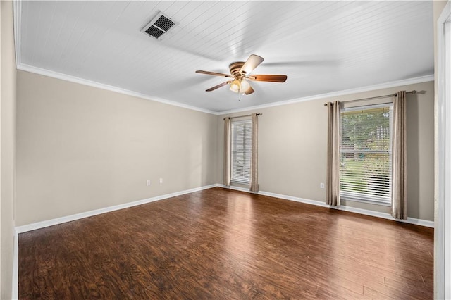 426 Devon Dr, Mandeville, LA 70448 - empty room featuring dark wood-style floors, ceiling fan, and ornamental molding